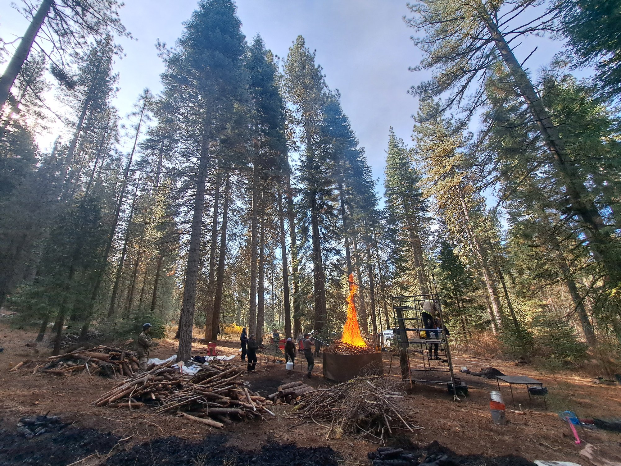 Flame-cap biochar kiln in operation at a TPBA workshop